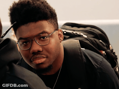Young Man Wearing Glasses And Black Shirt GIF