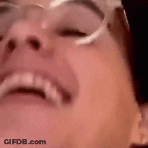Young Man Wearing Glasses And Blue Shirt GIF