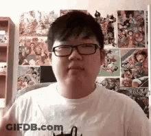 Young Man Wearing Glasses And White T-Shirt GIF