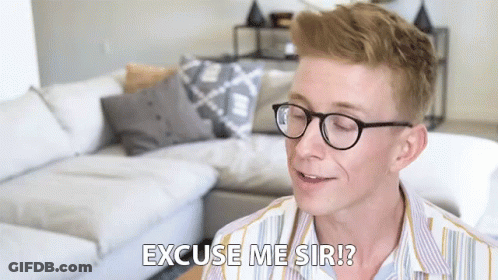 Young Man Wearing Glasses Saying Excuse Me GIF