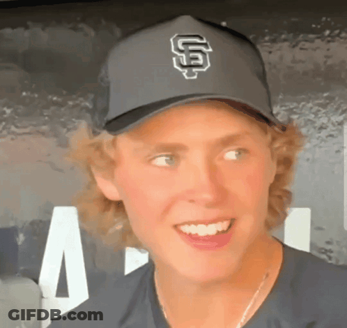 Young Man Wearing Hat With Letter G GIF
