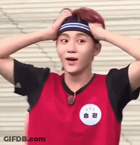 Young Man Wearing Headband Making Funny Face GIF