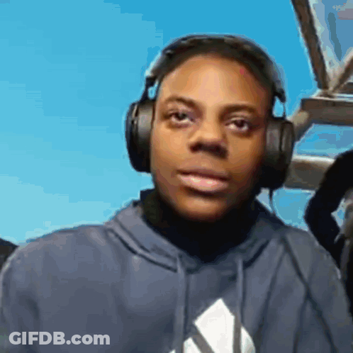 Young Man Wearing Headphones And Blue Sweatshirt GIF