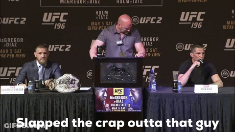 Young Man Wearing Headphones At Desk GIF