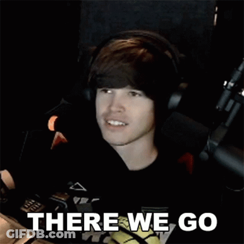 Young Man Wearing Headphones Sitting In Front Of Microphone GIF
