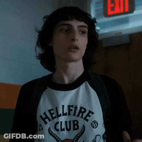 Young Man Wearing Hellfire Club Shirt GIF