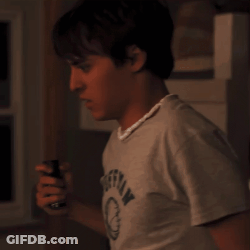 Young Man Wearing Offerman Grey Shirt GIF
