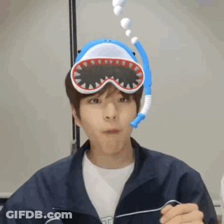 Young Man Wearing Shark Mask And Goggles GIF