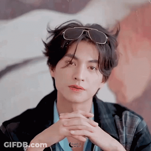 Young Man Wearing Sunglasses And Jacket GIF