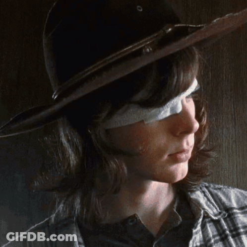 Young Man With Bandage On Eye Wearing Hat GIF