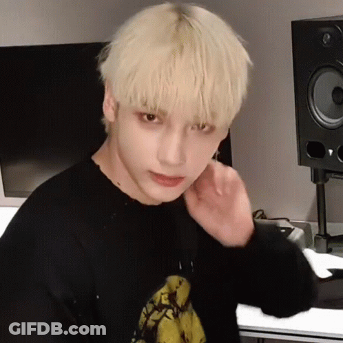 Young Man With Blonde Hair And Banana Shirt GIF