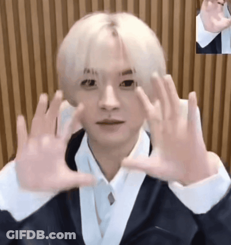 Young Man With Blonde Hair Making Funny Face GIF