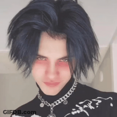 Young Man With Blue Hair In Black Turtleneck And Silver Chain GIF