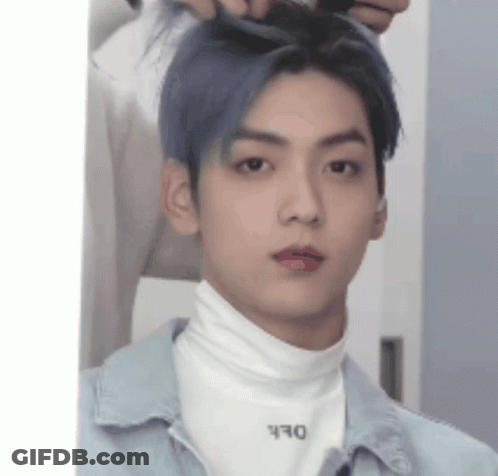 Young Man With Blue Hair Wearing White Turtleneck GIF