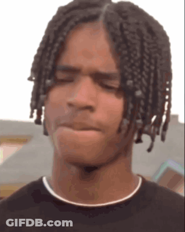 Young Man With Braids Making Funny Face GIF