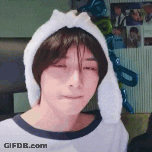 Young Man With Bunny Ear Headband GIF