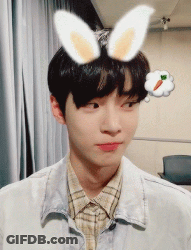 Young Man With Bunny Ears And Carrot Thought GIF