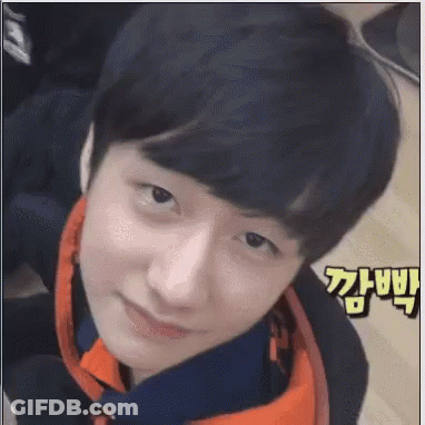 Young Man With Chinese Writing GIF