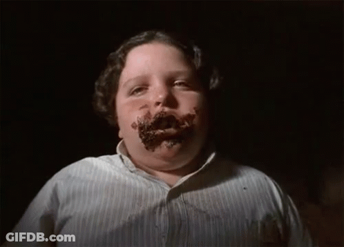 Young Man With Chocolate On Face In Striped Shirt GIF