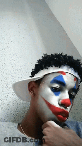 Young Man With Clown Makeup GIF
