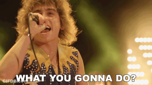 Young Man With Curly Hair Close Up GIF