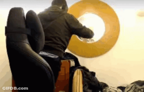Young Man With Curly Hair Hugging Woman GIF