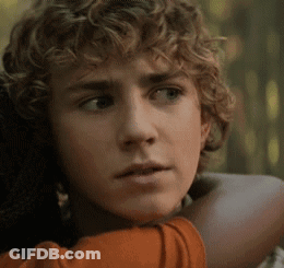 Young Man With Curly Hair Hugging Woman GIF