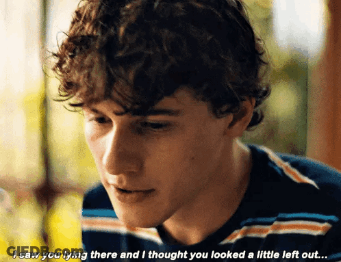 Young Man With Curly Hair Saying I Saw You Lying There GIF