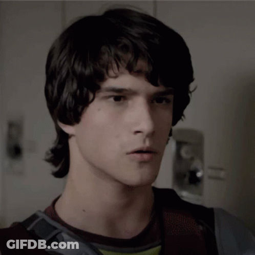 Young Man With Dark Hair Close Up GIF