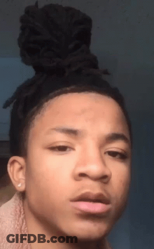 Young Man With Dreadlocks And Bun GIF
