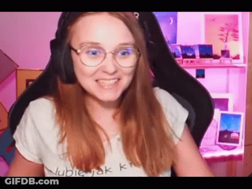 Young Man With Ear Buds Making Funny Face GIF