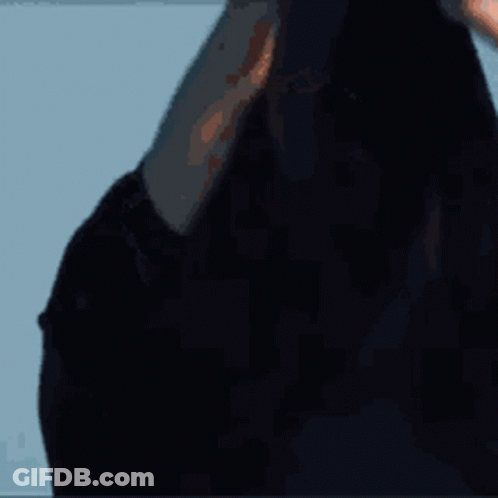 Young Man With Eyes Closed Against Blue Sky GIF