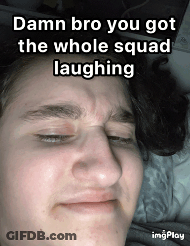 Young Man With Eyes Closed And Laughing Caption GIF
