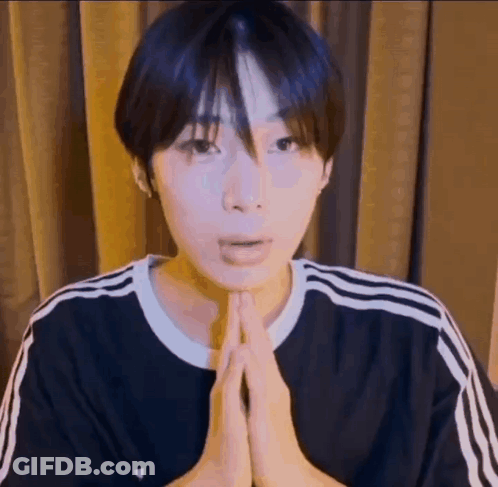 Young Man With Folded Hands GIF