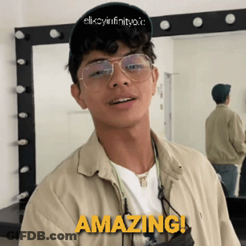 Young Man With Glasses And Hat Saying Amazing GIF