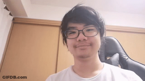 Young Man With Glasses And White Shirt GIF