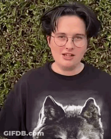 Young Man With Glasses And Wolf T-Shirt GIF