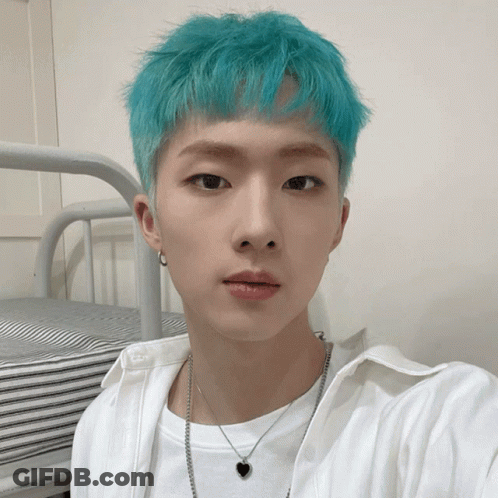 Young Man With Green Hair Taking Selfie GIF