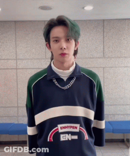 Young Man With Green Hair Wearing Enhypen Shirt GIF