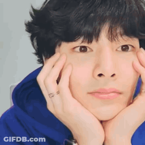 Young Man With Hands On Face GIF
