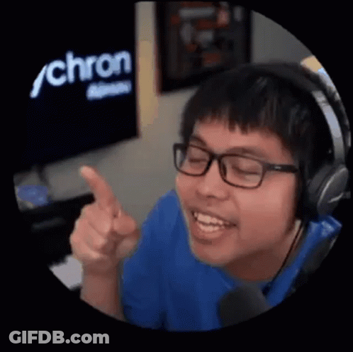 Young Man With Headphones And Glasses Pointing GIF
