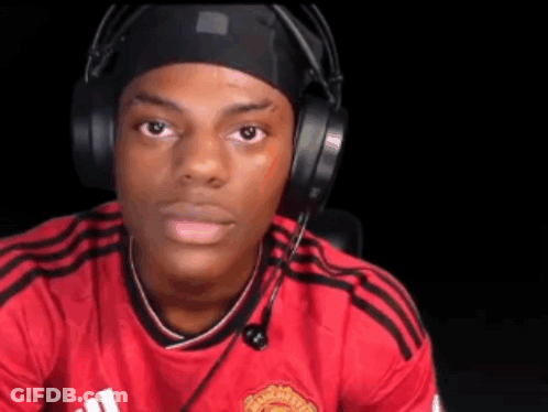 Young Man With Headphones And Headband Looking At Camera GIF