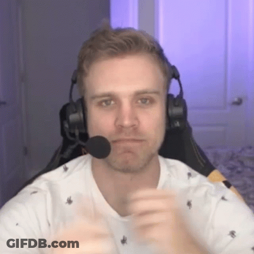 Young Man With Headphones And Microphone Sitting In Chair GIF