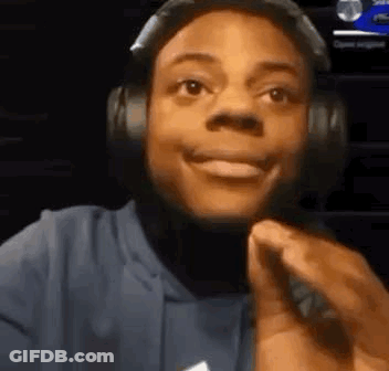 Young Man With Headphones And Microphone Smiling GIF