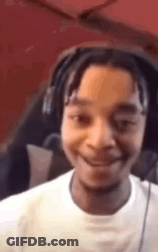 Young Man With Headphones Funny Face GIF