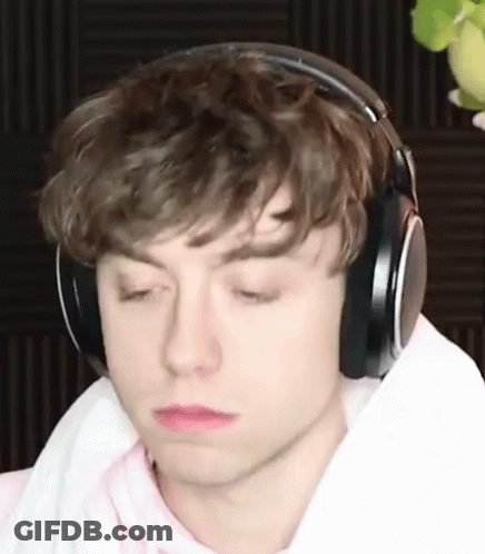 Young Man With Headphones GIF