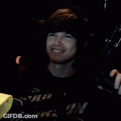 Young Man With Headphones Wearing No Time Shirt GIF
