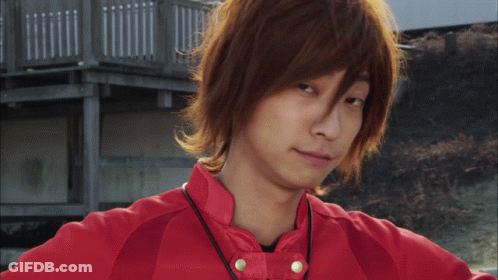 Young Man With Long Brown Hair And Red Jacket GIF