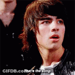 Young Man With Long Hair Says That's The Song GIF