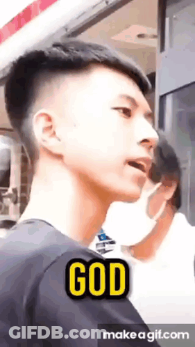 Young Man With Mask In Front Of Window Saying God GIF